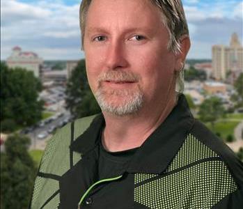 Man in front of Monroe Skyline