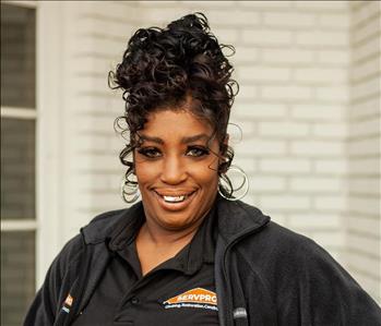 Woman with curly black hair 