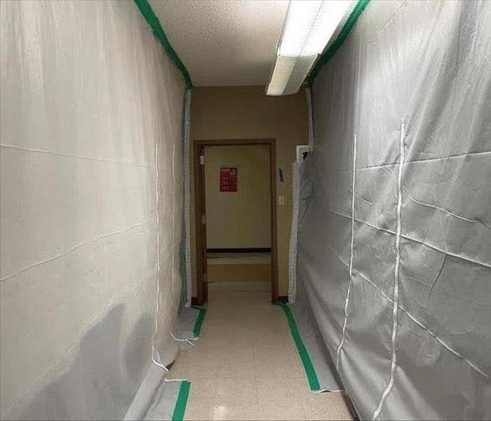 hallway with poly containment barriers